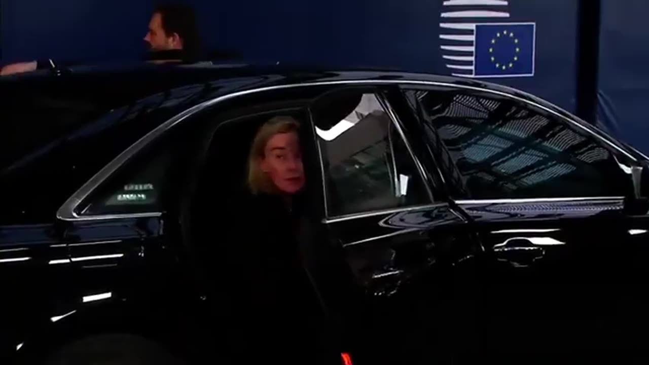 Federica Mogherini (Another Dude)