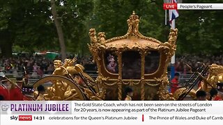 A hologram of the Queen drove through London, and people waved at it