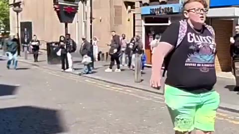 Woman attacks and assaults Edge of The Matrix because he was holding a sign and debating