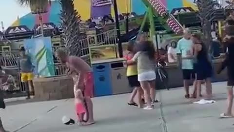 Shocking Knockout: Man Dropped in Front of His Daughter