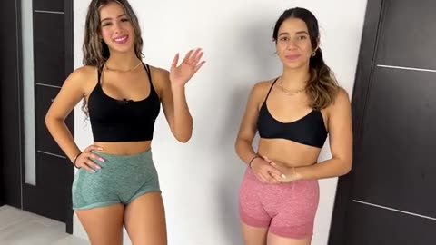 Sisters Stretching Each Other Post Workout