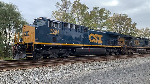 CSX Engines 7094 and 7018 pull a train East