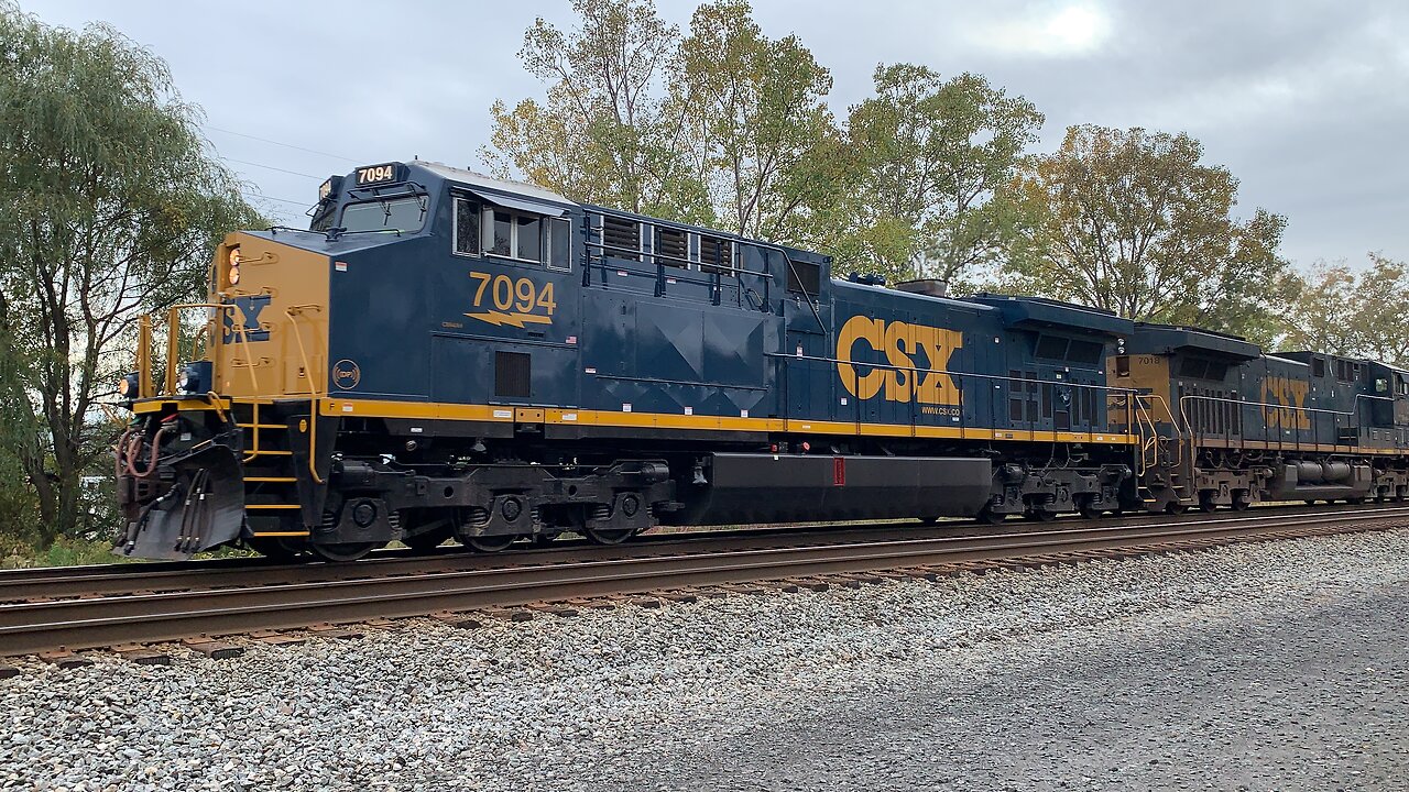 CSX Engines 7094 and 7018 pull a train East