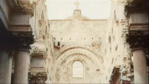 The damaged facade of Arras Cathedral