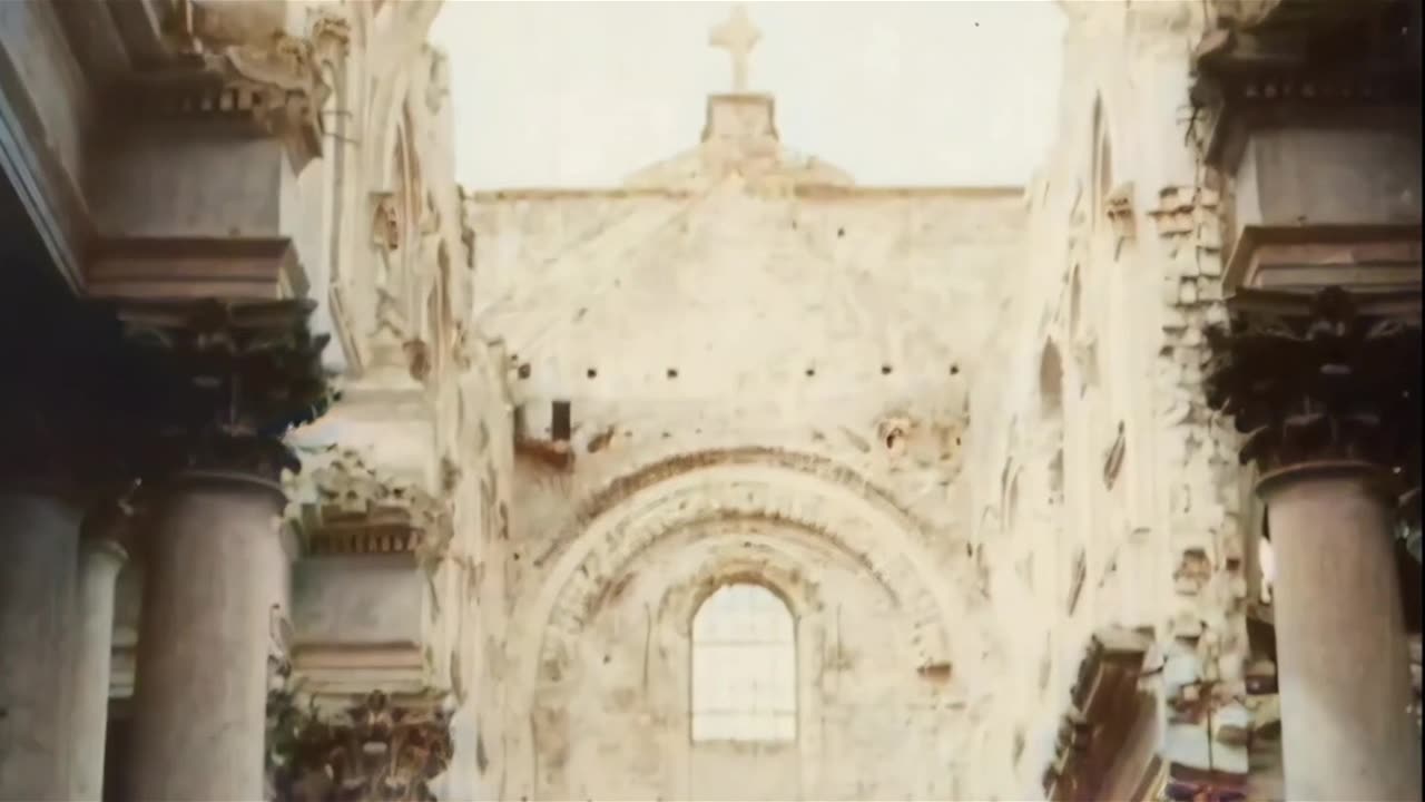 The damaged facade of Arras Cathedral