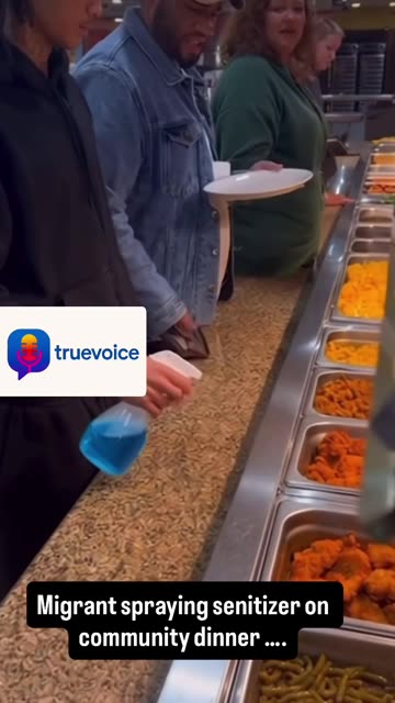 Migrant spray community food with sanitizer