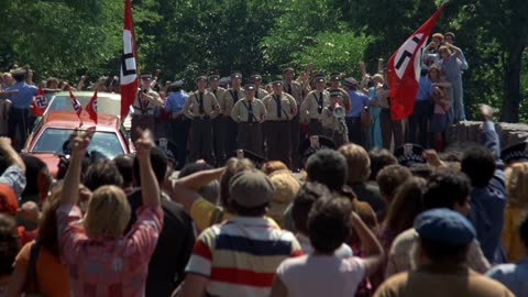 Two men try to drive through MAGA rally crowd