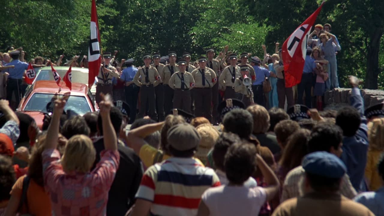 Two men try to drive through MAGA rally crowd