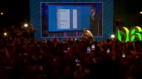 Dutch centrist party supporters cheer as exit poll puts them ahead