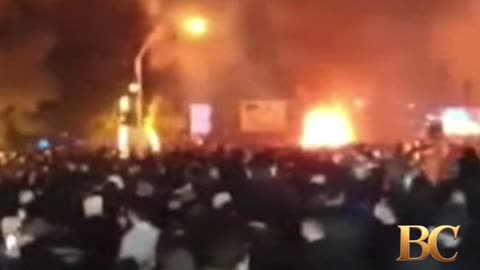 Tehran on fire as furious protesters ‘burn Iranian regime building down’