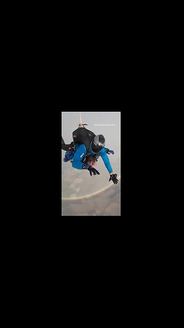 Skydivers Reveal the Unseen Side of a Rainbow
