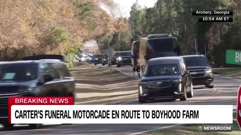 Jimmy Carter’s motorcade passes his boyhood home for the last time