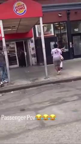 Possessed demon bum lady jumps onto moving car..