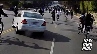 Los Angeles driver nearly hits massive group of teenage bicyclists