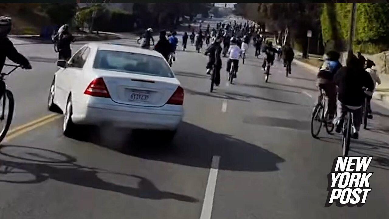 Los Angeles driver nearly hits massive group of teenage bicyclists