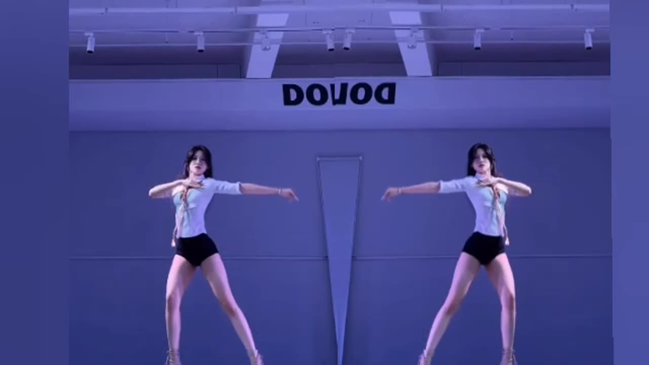 Beautiful Chinese girl dancing very attractively