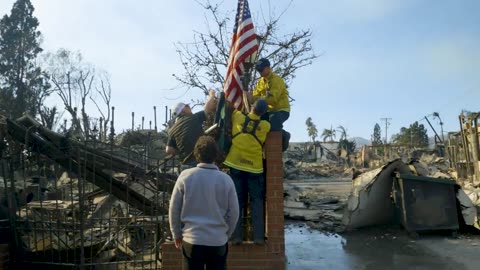 Amidst the devastation of the Palisades Fire, a firefighting crew briefly paused