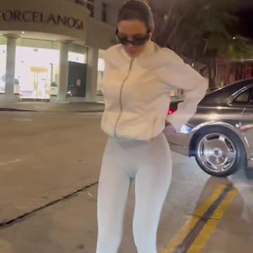 Kanye West stops traffic so his wife can do a photoshoot in the middle of the street.