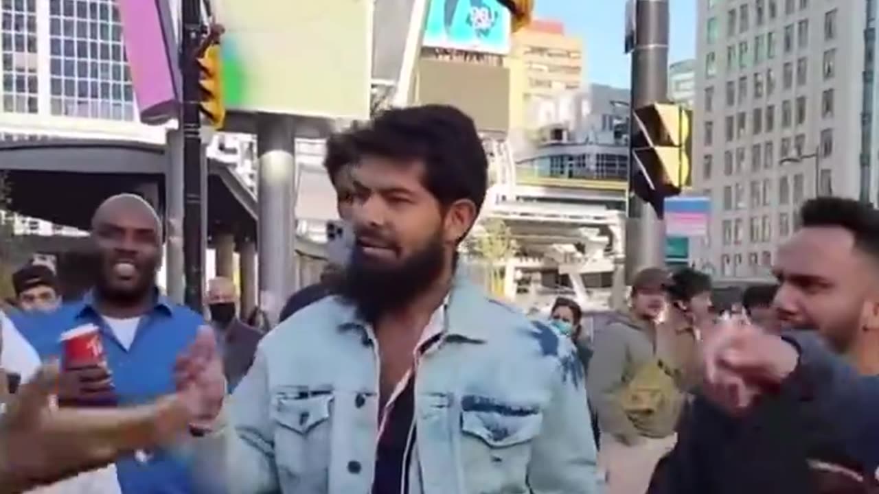 Angry members from the religion of peace surrounded a man preaching about
