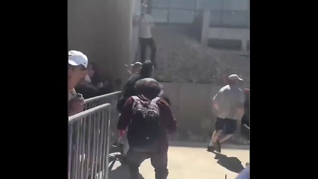 Guy was ALREADY waiting on the wall.