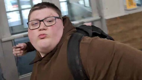 Fat Dork Is New Leftist Hero For Taking A Swing At Classmate Holding A Pro-ICE Sign