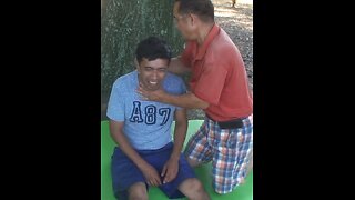 Luodong Massages Young Man At The Park