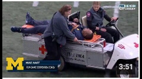 "Sudden Sideline Collapse of Michigan Coach Mike Hart"