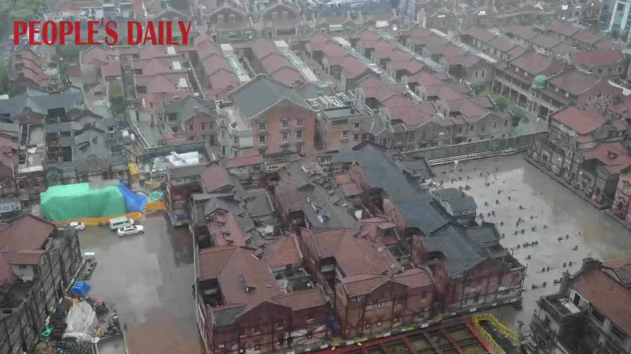 A 100-YEAR-OLD 7,500-TON SHIKUMEN BUILDING IN SHANGHAI BEING MOVED BACK TO ITS SPOT BY 432 WALKING ROBOTS