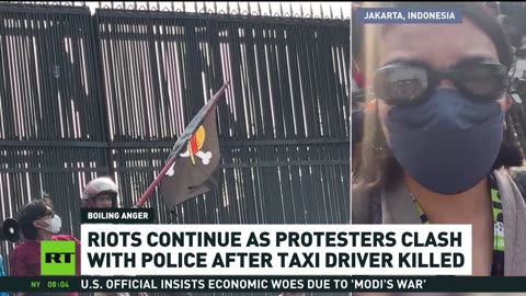 Protests in Indonesia escalate after taxi driver killed
