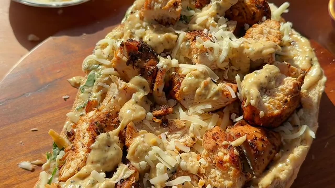 Baked bread with chicken breast and cheese