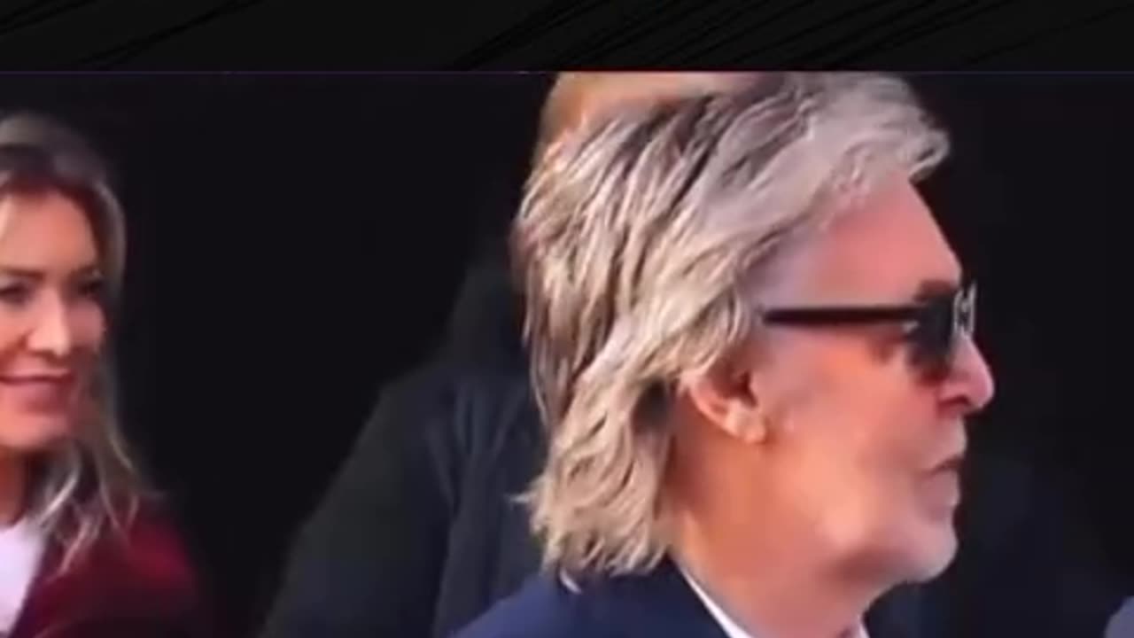When you see Paul McCartney..but who is that person behind him?