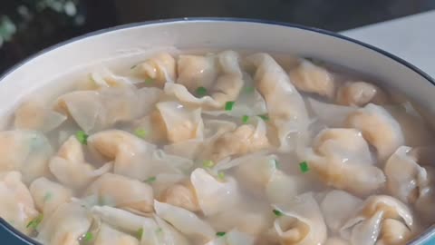 Making meat filled dumplings