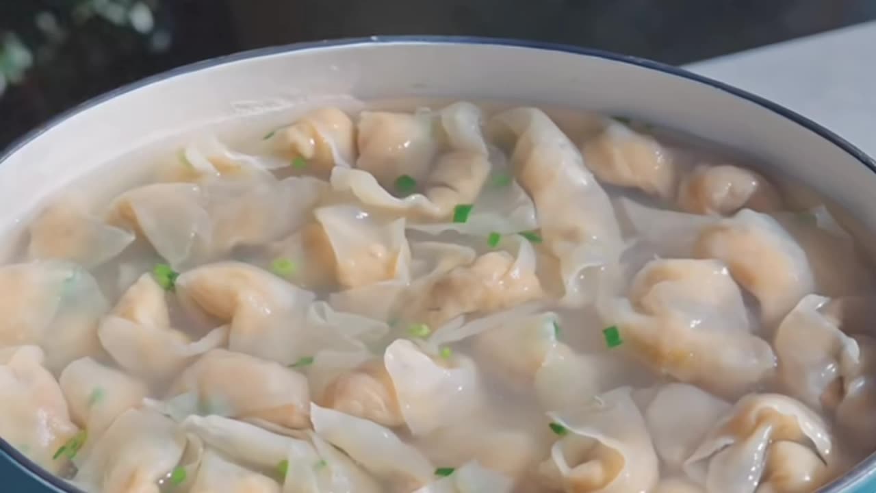 Making meat filled dumplings
