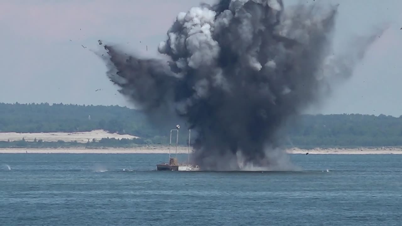 Russian Lancet and seaborne drone attack ship during exercises