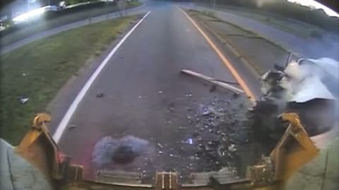 A car traveling at high speed rear-ends a garbage truck