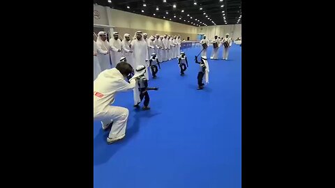 In Abu Dhabi, robots in traditional Emirati dress performed Al Ayyala