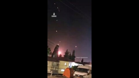 A barrage of Iranian missiles making impact in Tel Aviv 