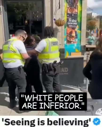 An Angry Shaniqua throws food at a wht wmns head because.......she was wht.