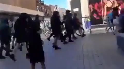 An Islamic stand handing out Koran in Liverpool was swept away by British patriots.