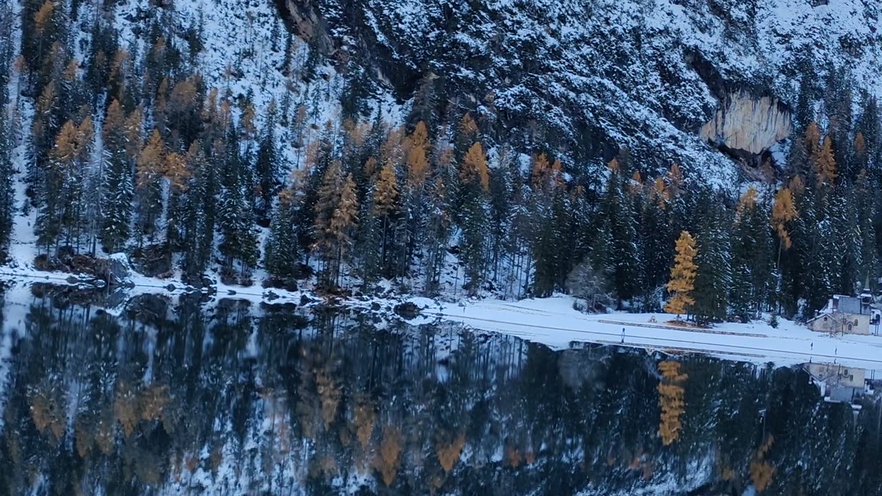 Snowy Mountains Reflected in Crystal-Clear Alpine Lake