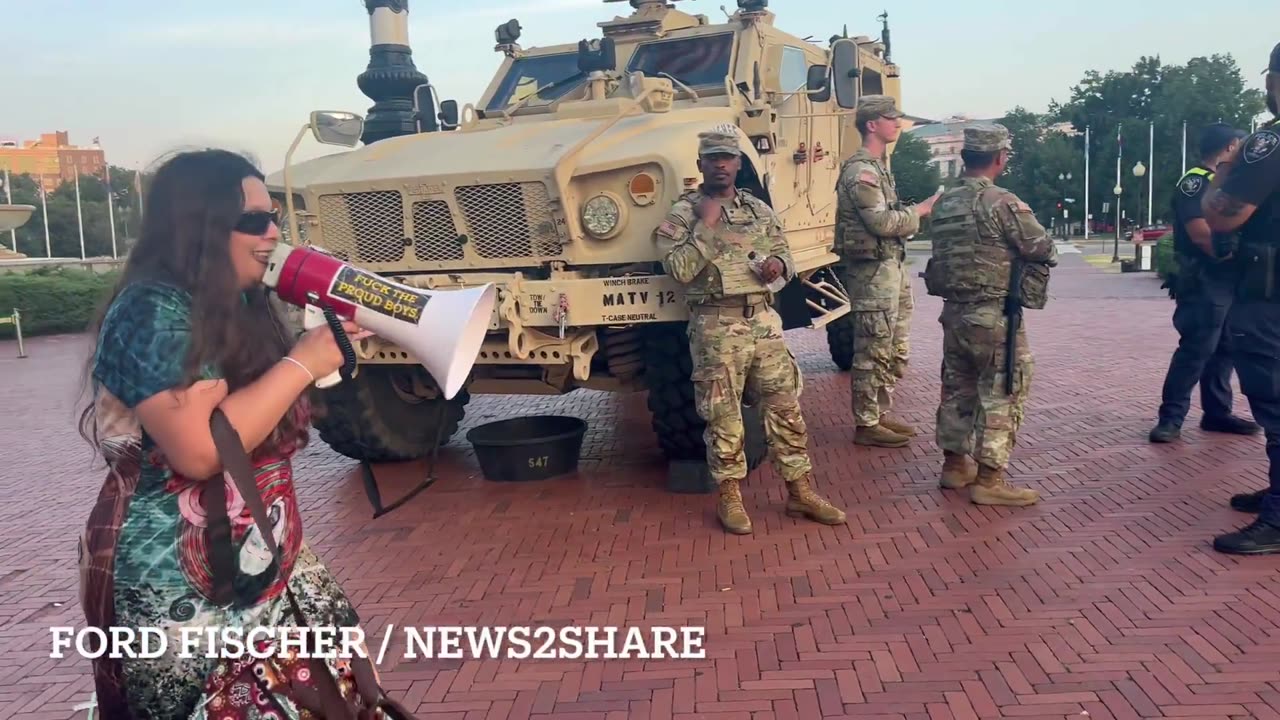 DC protestor yells: "Free DC! You're following orders from an insurrectionist!"