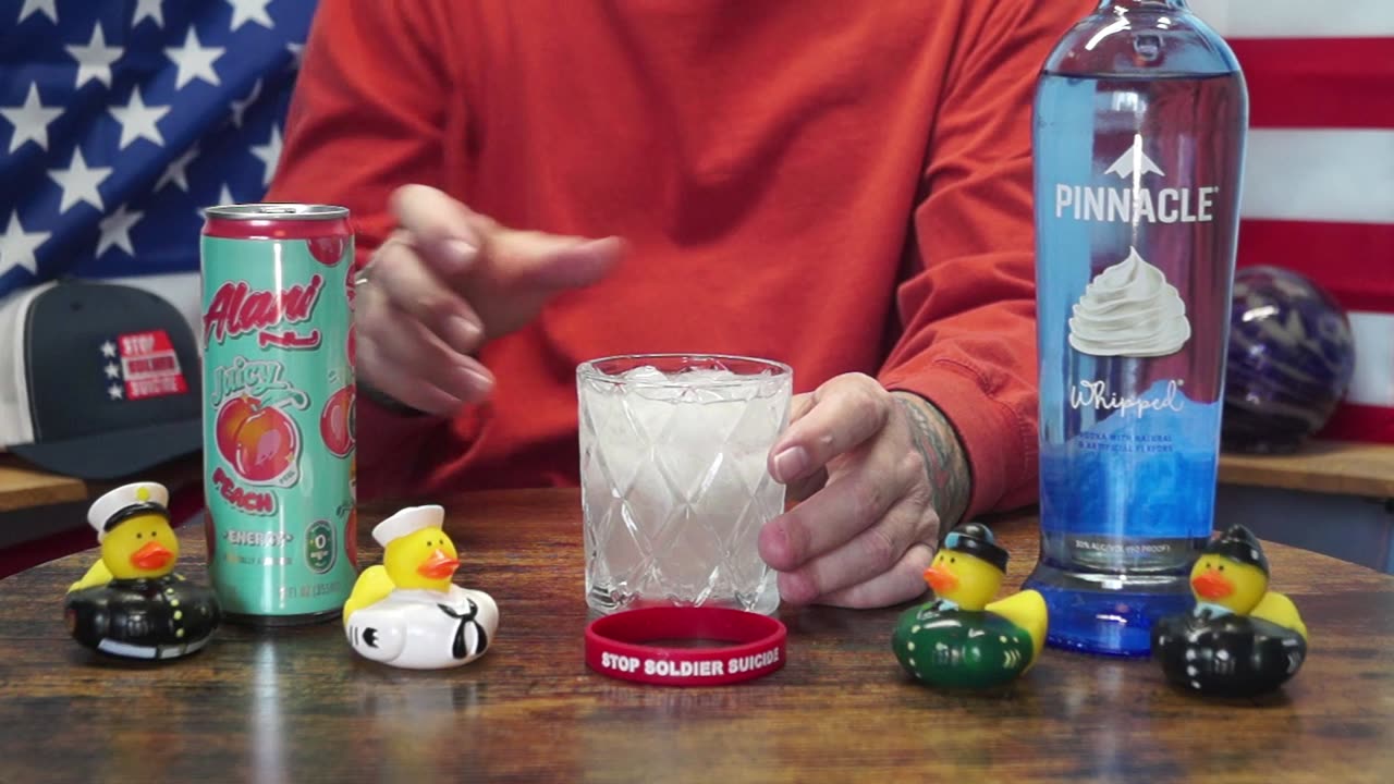 John Rhodes - Pinnacle Whipped Vodka & Alani Juicy Peach Energy Drink