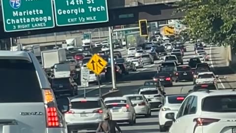 Man in a Wheelchair Merges With Traffic in Atlanta