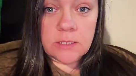 A mother reacts after her child brings home a Bible from school.