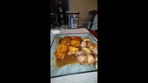 Eating Smoky Bourbon Atlantic Salmon, Dbn, MI, 5/13/25