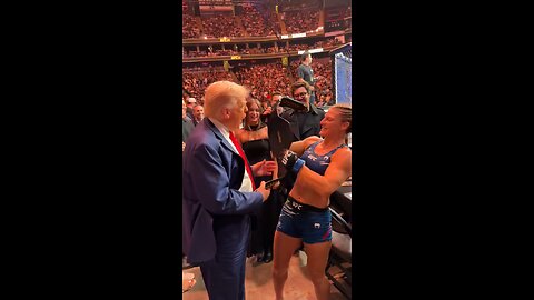 Joseph Martelli Niagara Falls, NY Donald Trump with Kayla Harrison