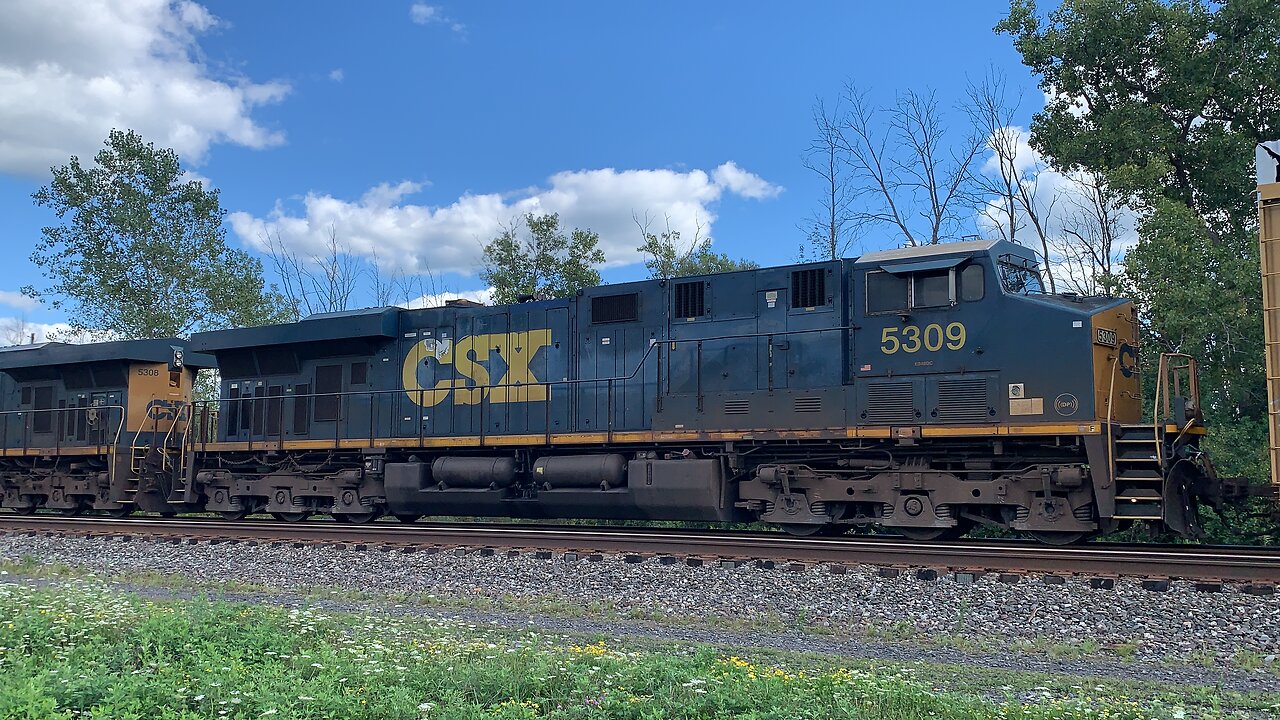 CSX Trains 5308 and 5309 head East