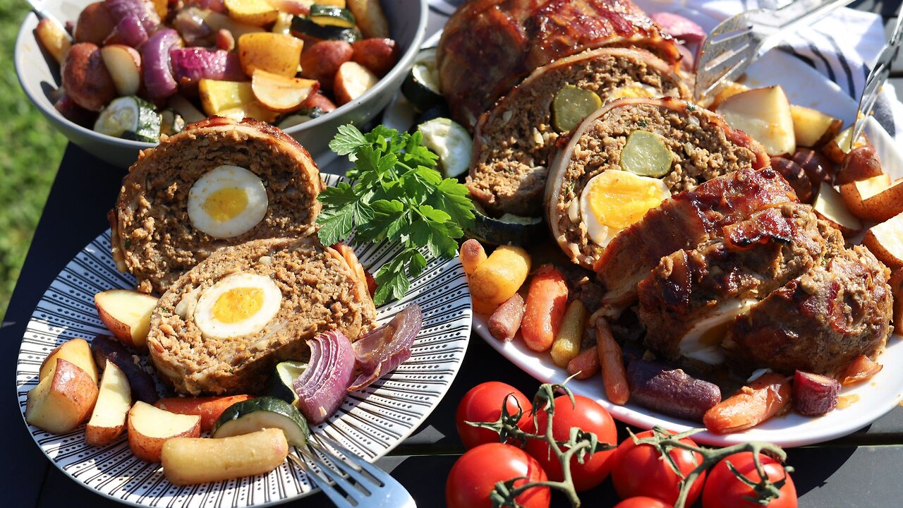 The Ultimate Meat Lover's Dream! Bacon Wrapped Meatloaf Stuffed with Hard Boiled Eggs and Pickles