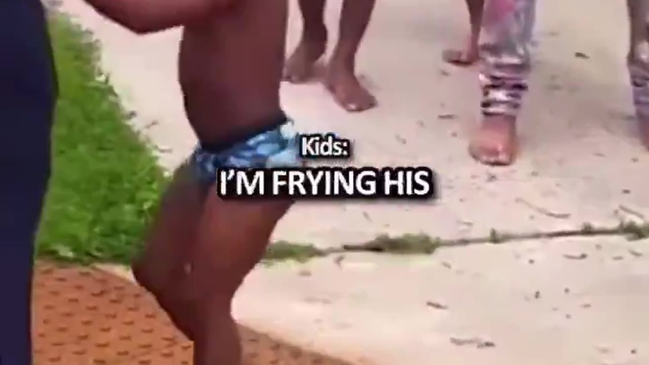 Negro chillrin' chimpout on cops. They will be dead before 14. Zero parenting.