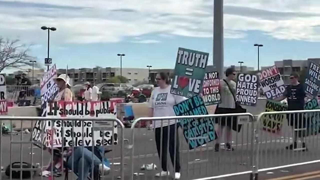 Liberal terrorlsts are really protesting outside of the Charlie Kirk memorial..